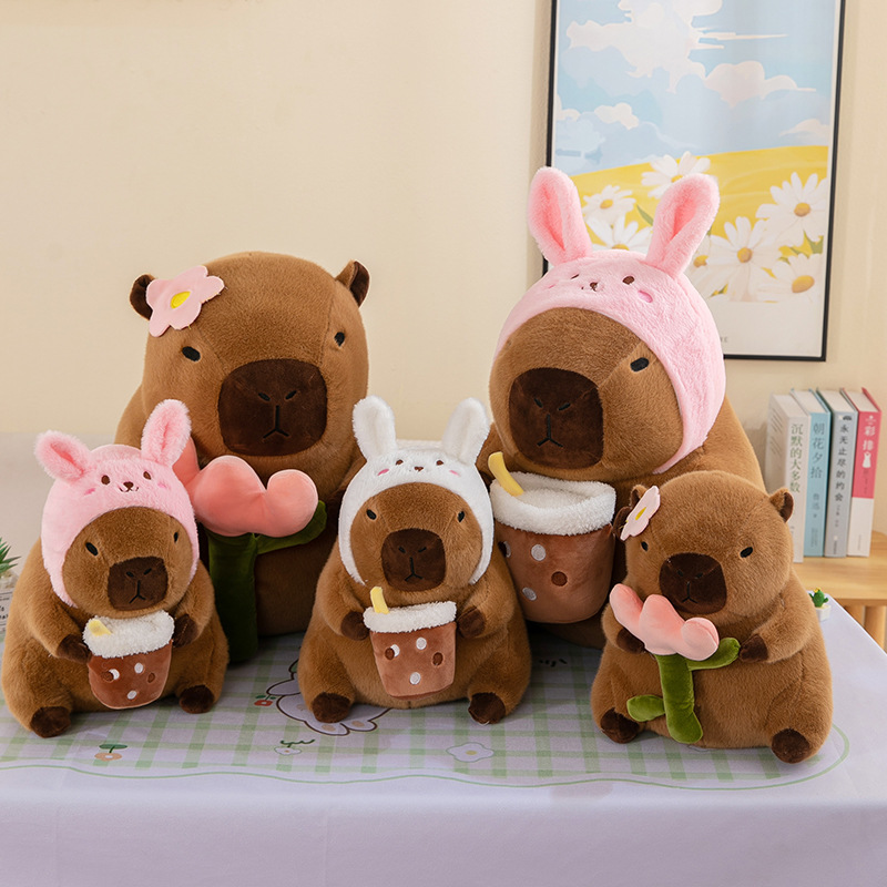 Gấu Bông Capybara Ôm Trà Sữa Cosplay Thỏ thumb
